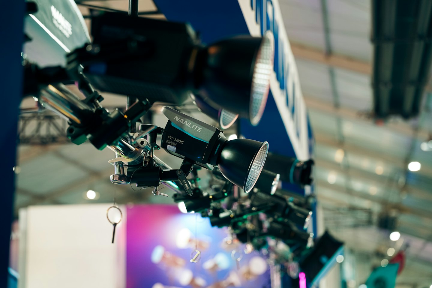 Nanlite LED studio lights mounted on an indoor metal truss.