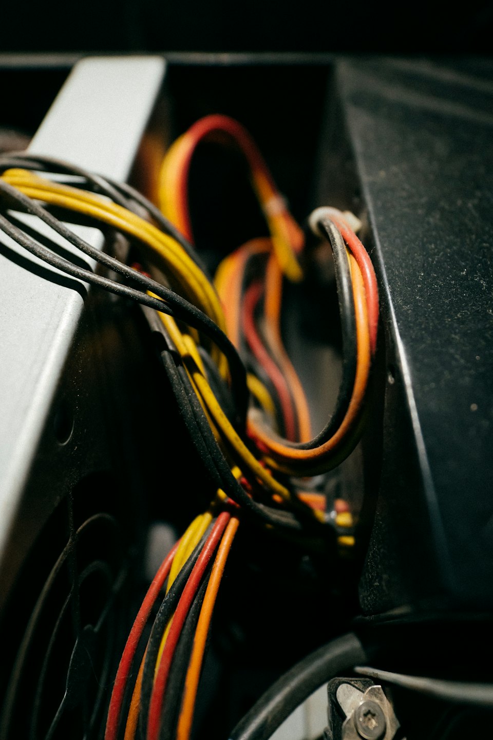 Colorful wires connect internal components of a computer.